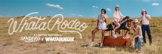 A vintage booth in a grassy field displays the Whataburger x Sendero Limited-Edition Collection with apparel, hats, a boombox, and Whataburger food on orange trays.