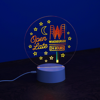 Neon-style lamp with 'Open Late' and 'Whataburger 24 Hours' text on a dark background