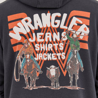 Close-up of the back design of the Wrangler® x Whataburger® Faded Black Hoodie, showing an illustration of two cowboys riding horses, a steer, and bold typography that reads "Wrangler Jeans Shirts Jackets" over the Flying W background.