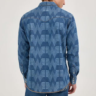 Back view of the Wrangler® x Whataburger® Men's Western Print Shirt – A male model stands with his back to the camera, showcasing the all-over Flying W pattern across the Wrangler® x Whataburger® Men's Western Print Shirt. The yoke detailing enhances the Western aesthetic.