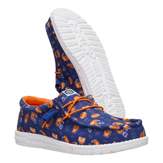 Blue shoe with orange pattern and orange laces on a white background