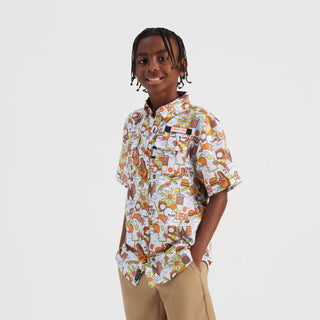 Child wearing a colorful patterned shirt on a white background