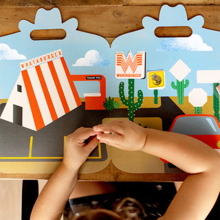 Child playing with Whataburger Little Foodies Sticker Play Set