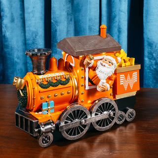 View Whataburger Holiday Train Figurine on wooden surface with blue curtain background. 