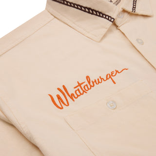 Beige shirt with 'Whataburger' embroidery on a white background