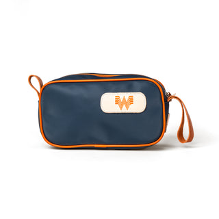 View front of Whataburger Jon Hart Navy/Orange Shave Kit