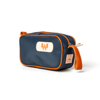 View side of Whataburger Jon Hart Navy/Orange Shave Kit