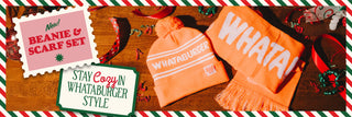 Orange beanie and scarf set with 'WHATA!' text on a wooden surface, surrounded by festive border.