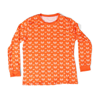 Orange long-sleeve pajama shirt with white Whataburger pattern on a white background
