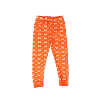 Orange children's pajama pants with white Whataburger pattern on a white background