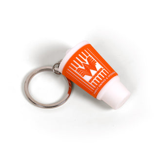 Whataburger Cup Replica Keychain lying on side.