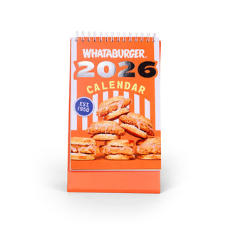 2026 Whataburger calendar with a stack of Honey Butter Chicken Biscuits on an orange background
