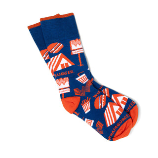 Blue and orange socks with Whataburger themed design on a white background
