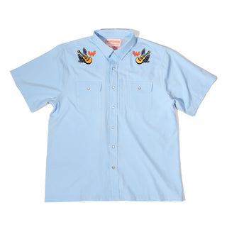 Light blue button-up fishing shirt with embroidered Flying W logo, guitar, and bluebonnets on a white background.