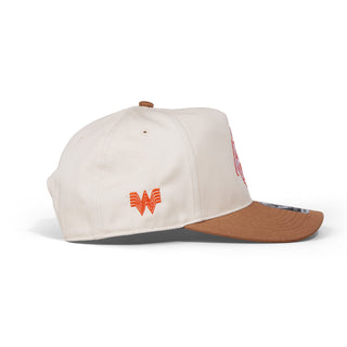 Cap with brown visor and white body on a white background and Orange Whataburger logo embroidered.