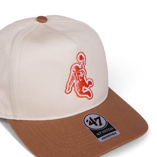 Beige and brown cap with orange Houston Rockets Dunk-stronaut logo and '47' brand label on a white background.