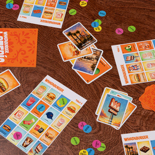 Whataburger Loteria Version 2 laid out on wooden table