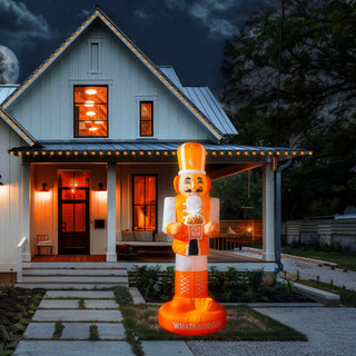 View Whataburger inflatable nutcracker in front of house at night