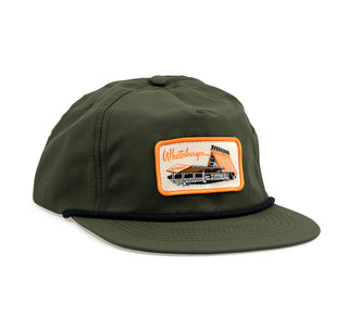 View olive green hat with black rope. Patch on the front of the hat has whataburger script font and an old school drive in style a frame building.